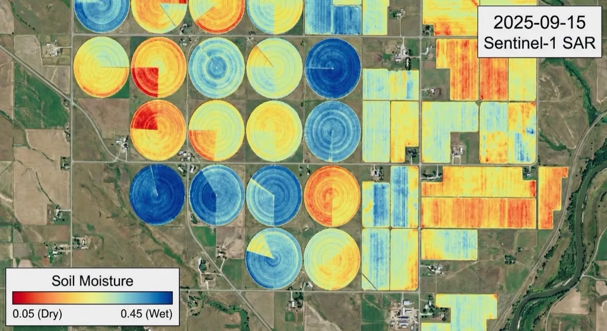 SAR-derived soil moisture map over center-pivot fields, wet pivots in blue, dry corners in red